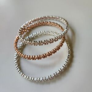 Elegant Silver and Gold-Toned Bangles